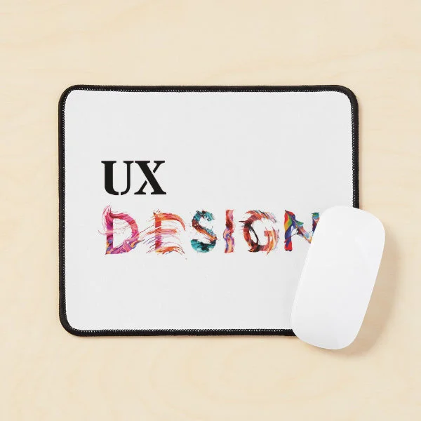 A mouse pad with the words "UX Design" in paint.